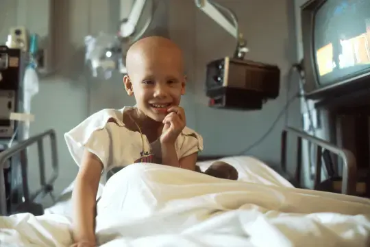 A young patient smiling.